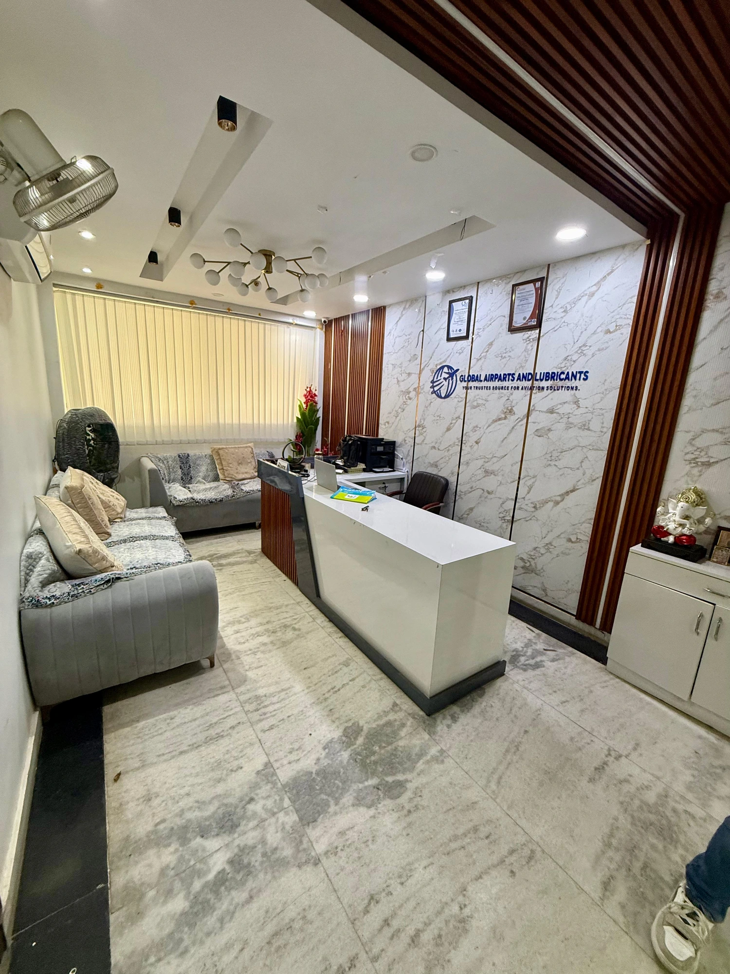 Reception area with ISO 9001 certificates at the Global Airparts New Delhi office