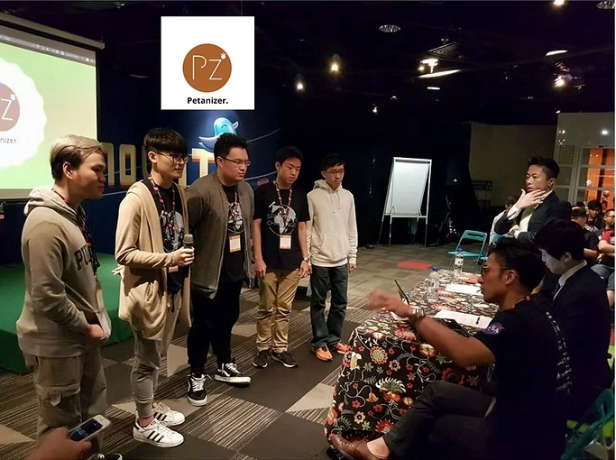 Armand taking part in a community presentation event